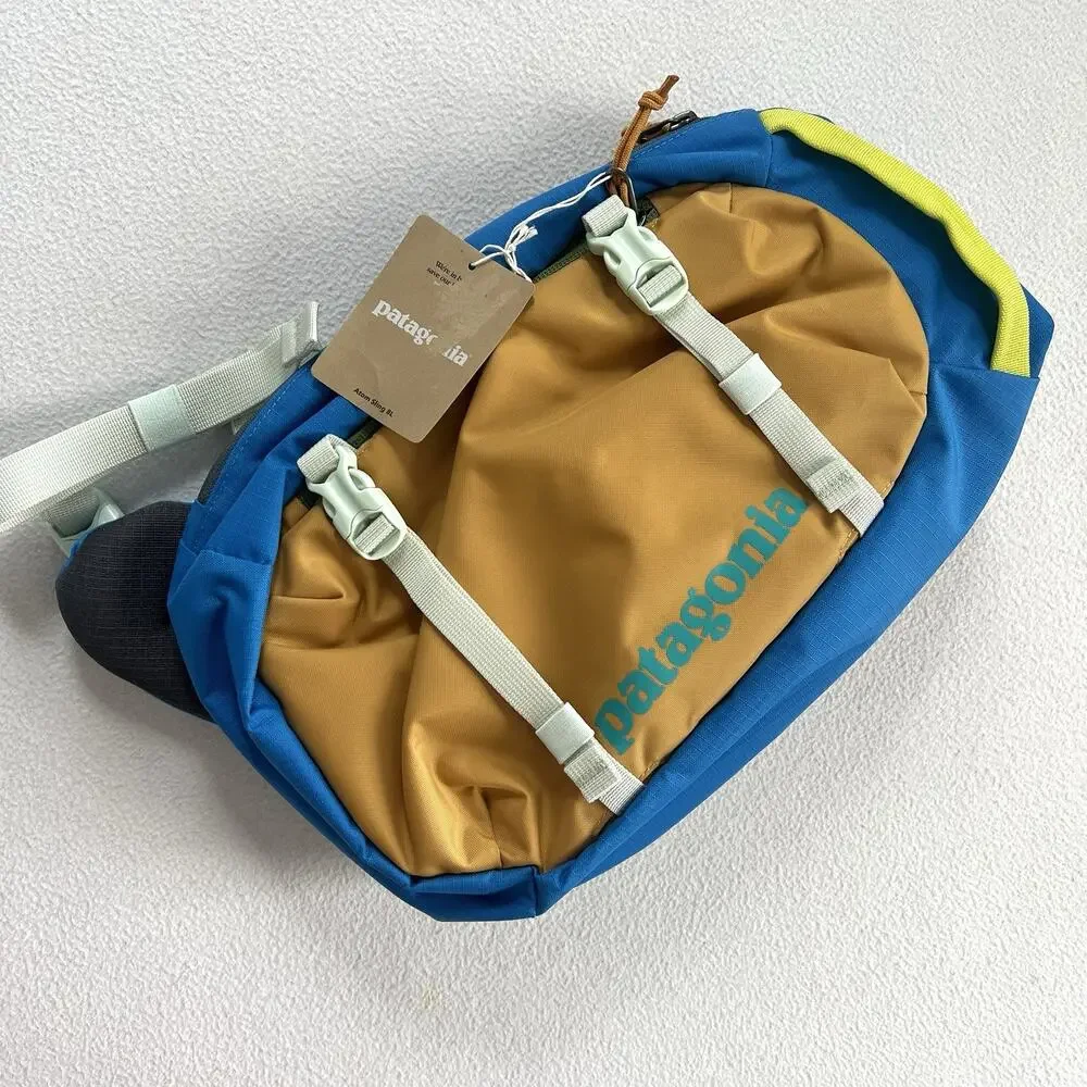 NWT Patagonia PWVL Patchwork Vessel Blue Gold Atom Sling 8L Backpack Bag 48262